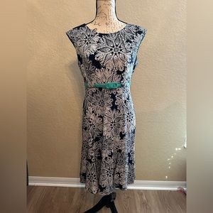 Nave blue dress with teal green belt. In excellent condition.